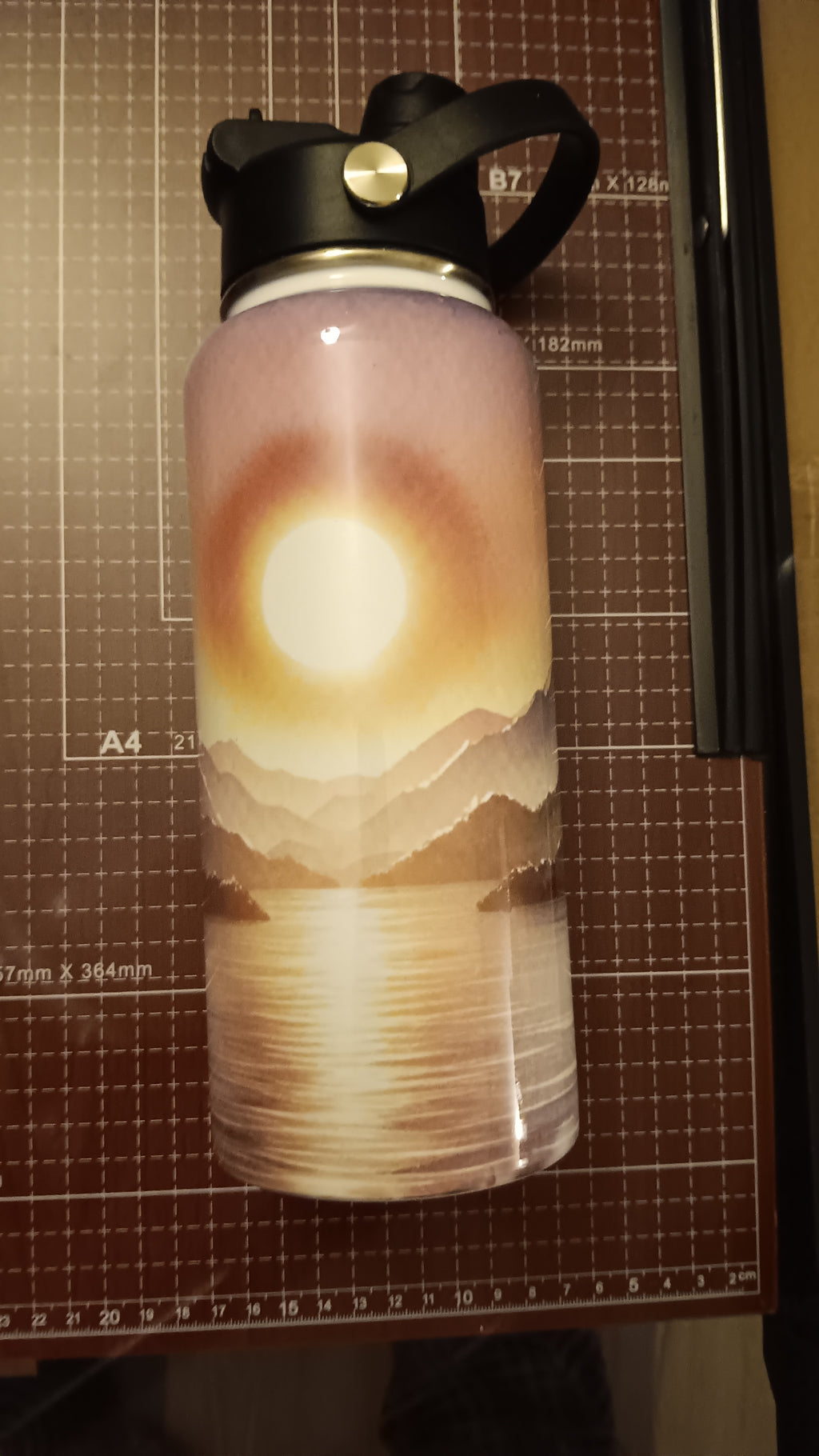 32 oz sunset themed Hydro Tumbler with a handle, pour spout, and closing straw