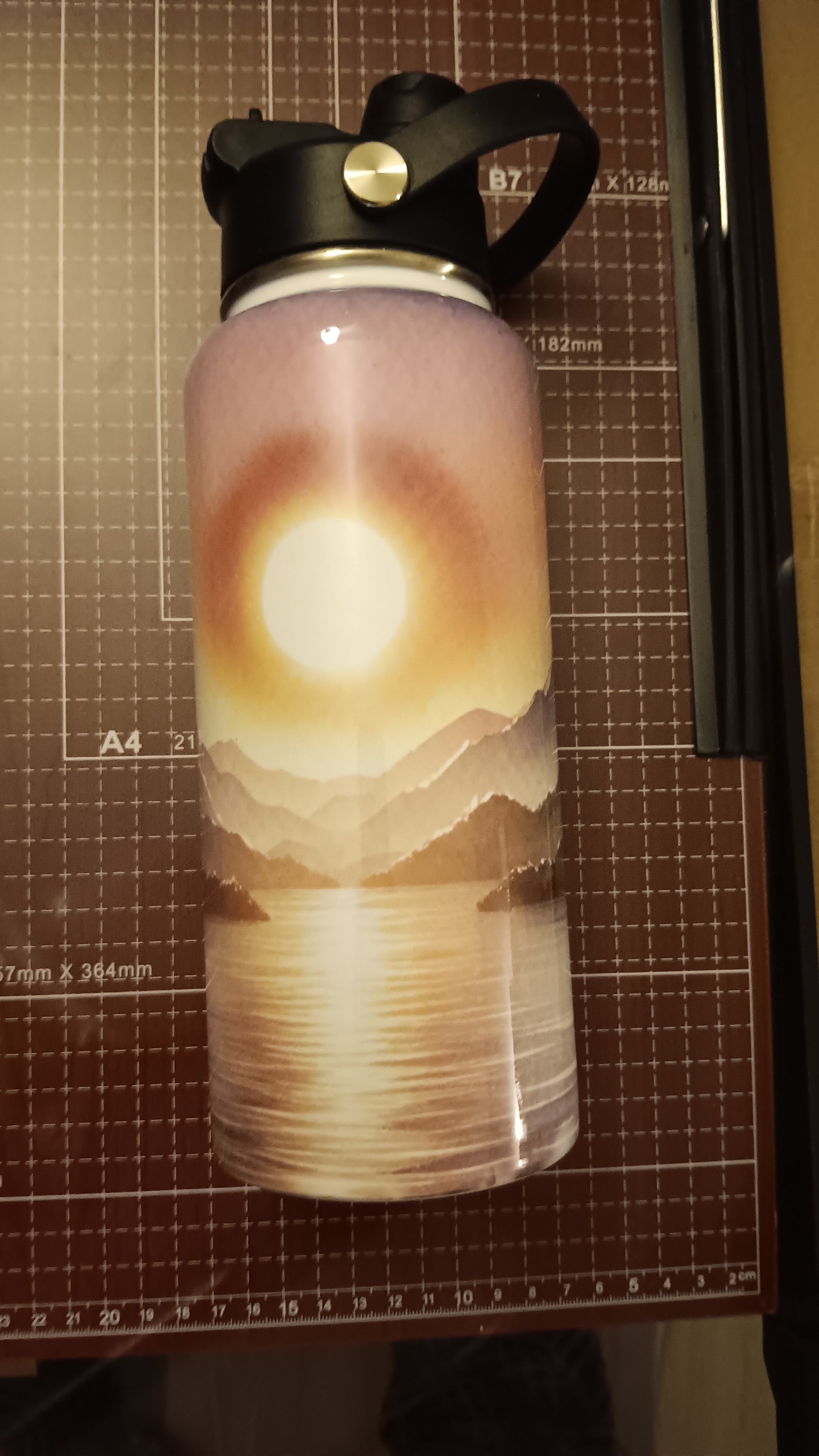 32 oz sunset themed Hydro Tumbler with a handle, pour spout, and closing straw