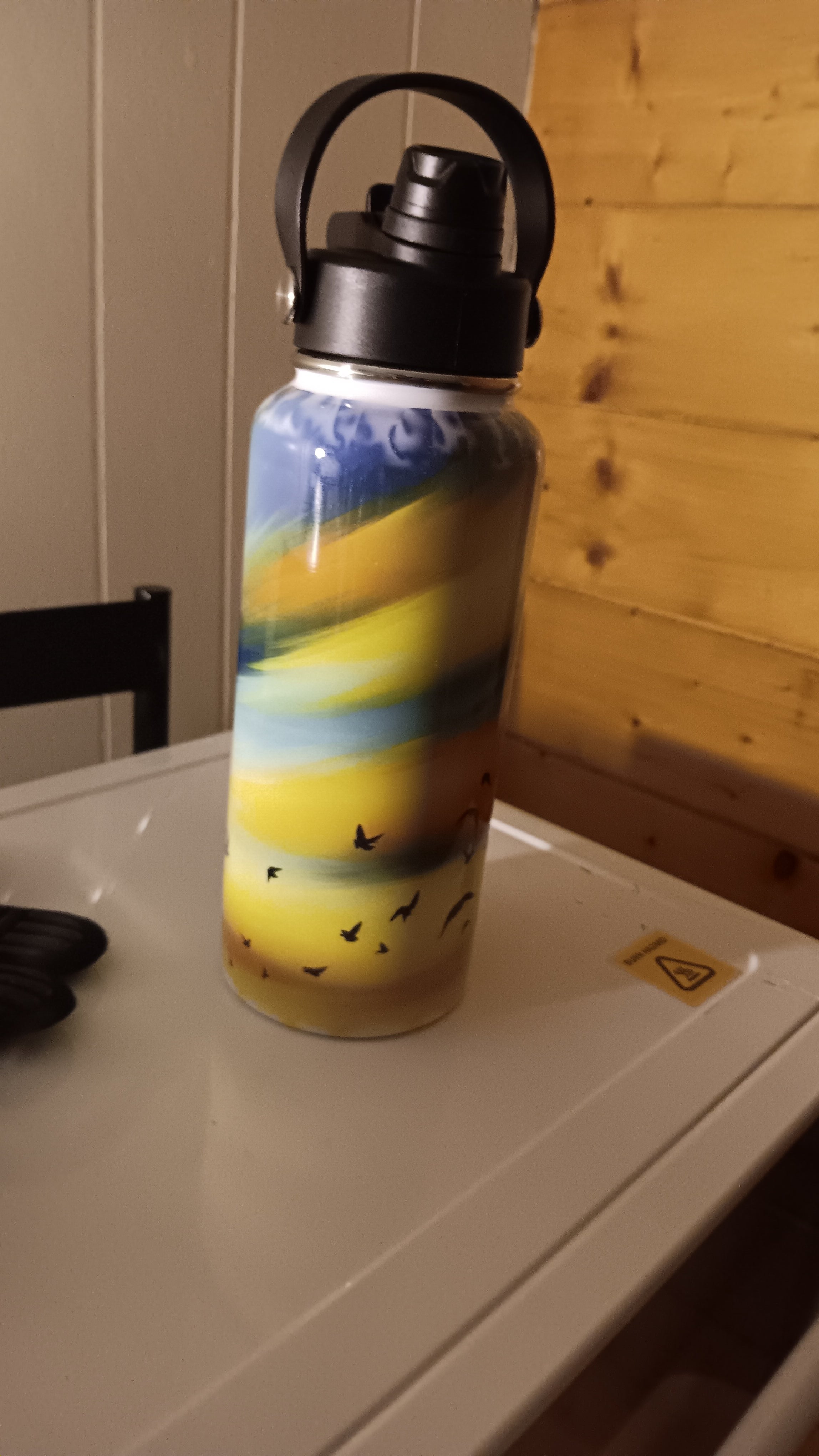 32 oz bird themed Hydro Tumbler with a handle, pour spout and closing straw.