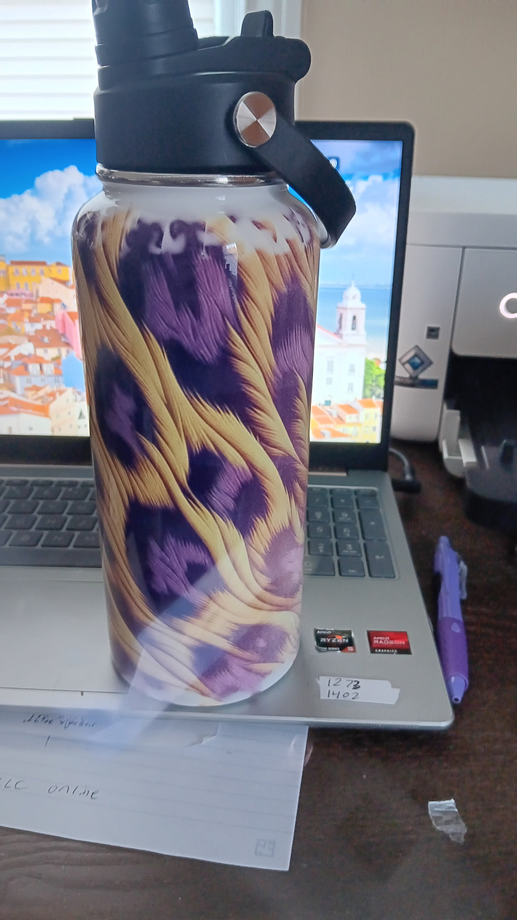 32 oz leopard print Hydro Tumbler with a handle, pour spout, and closing straw